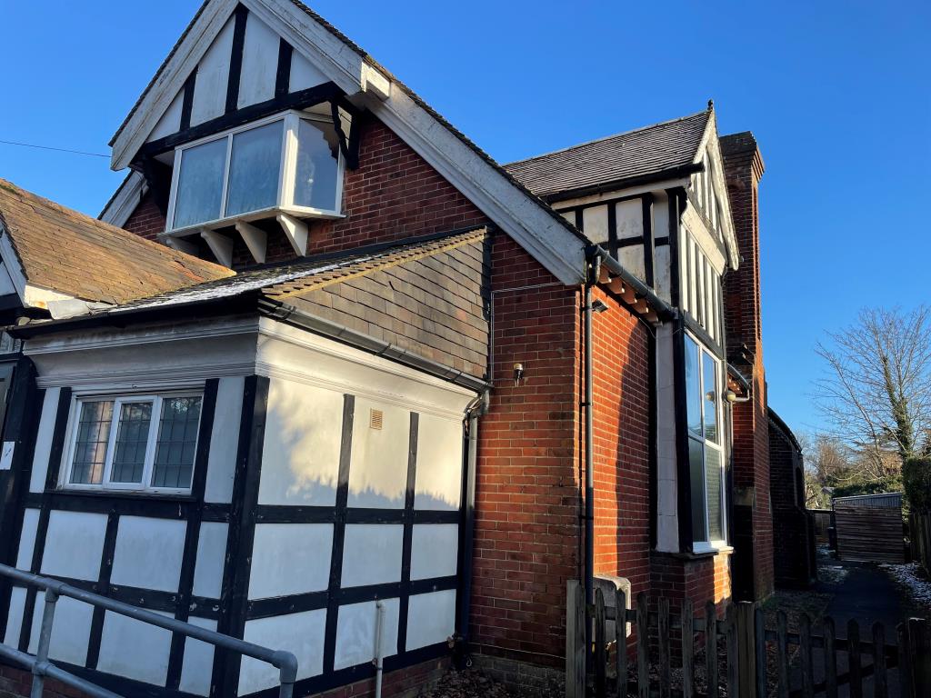Lot: 134 - FORMER VILLAGE HALL WITH CONSENT FOR CONVERSION INTO SIX RESIDENTIAL DWELLINGS - Side view with access